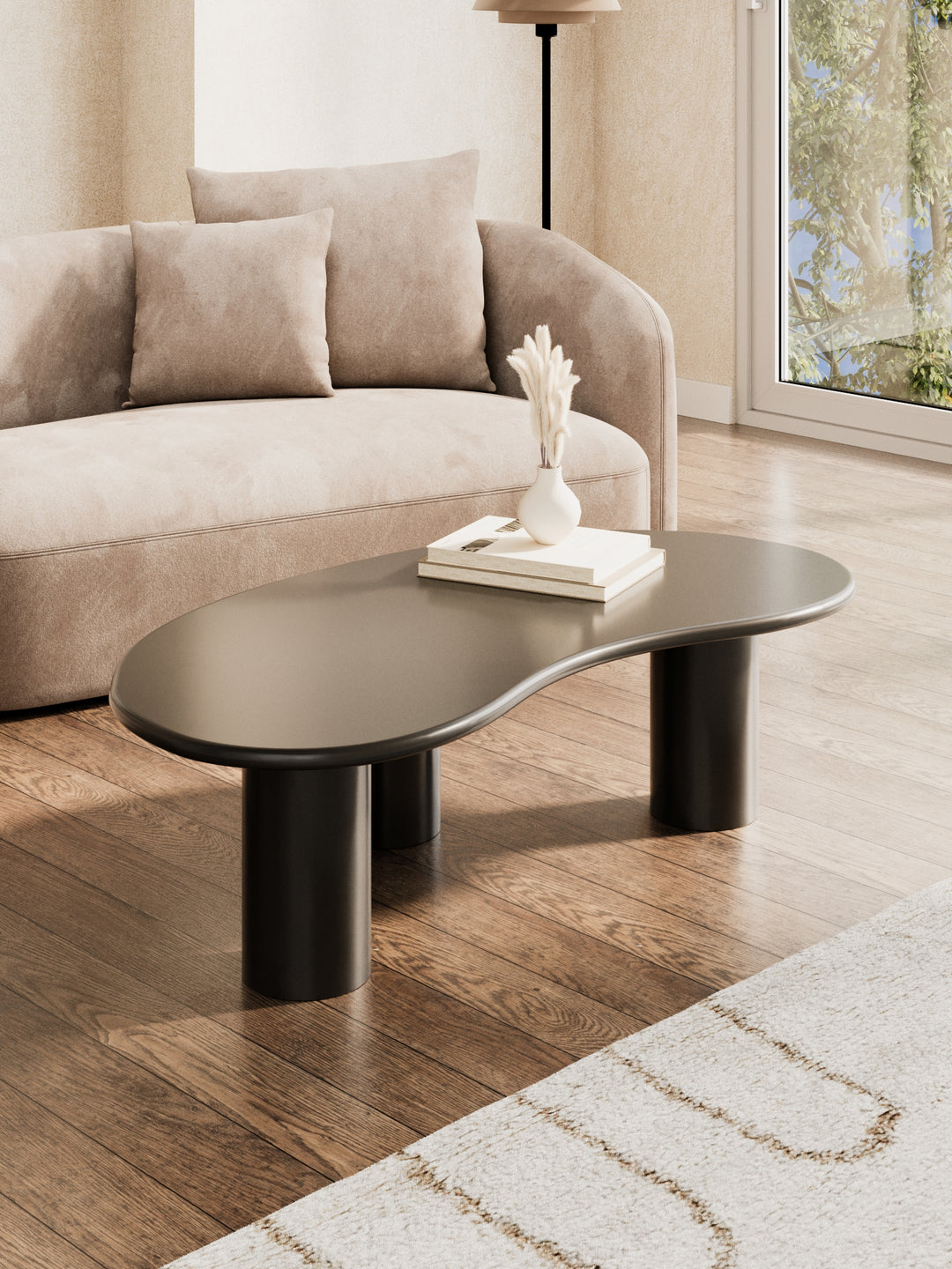 Devon Black Pebble Coffee Table in a modern living room, free metro delivery across Australia.