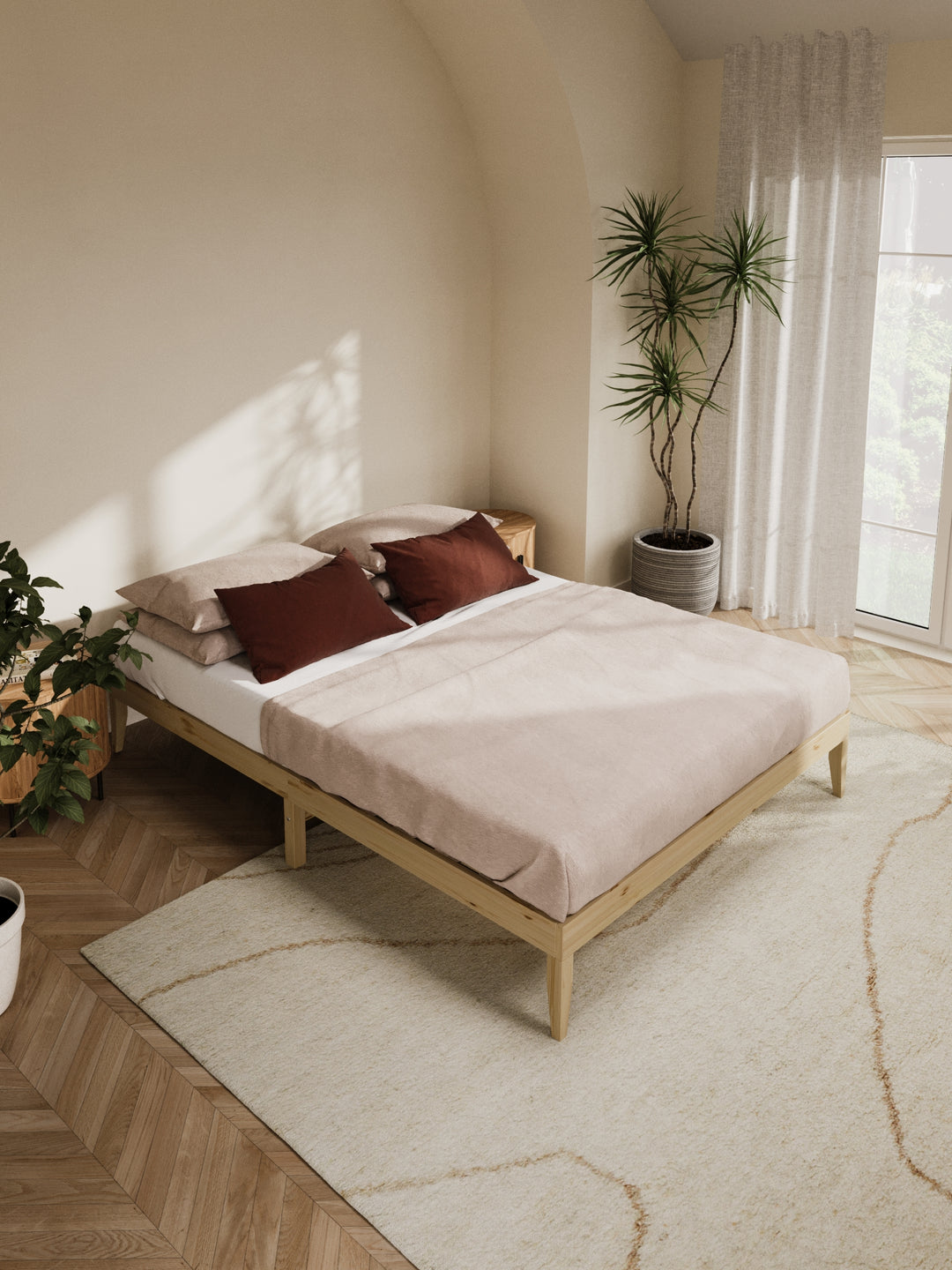 Contemporary bedroom featuring the Ventura Classic Wooden Bed Base in a clean, minimalist design. The natural light highlights the bed's sturdy construction and elegant finish, perfect for those looking to enhance their home with durable, stylish furniture. Paired with soft beige bedding and a lush view from the window, this bed base is ideal for modern décor enthusiasts.